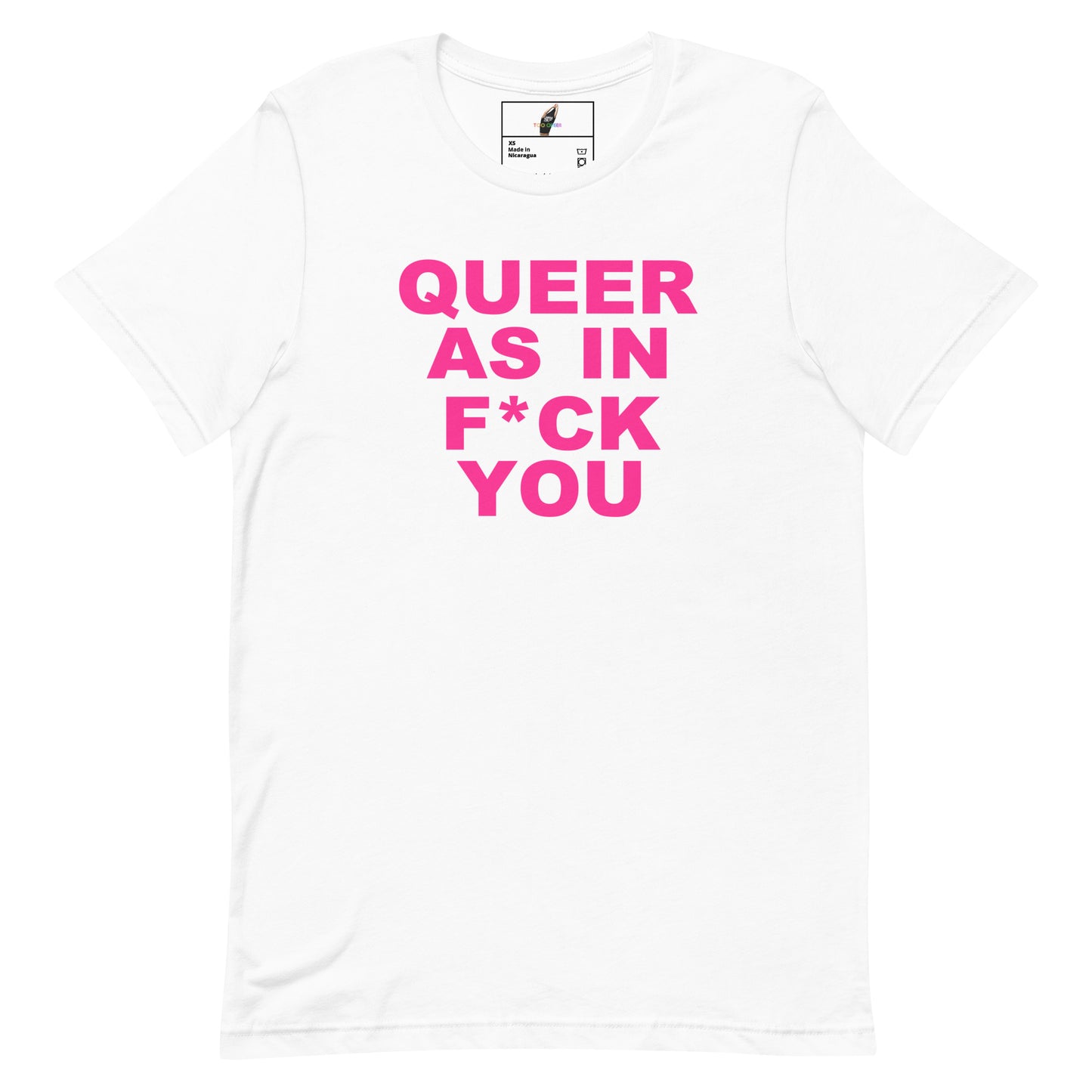 A white short-sleeve crewneck t-shirt with bold pink text on the front reading 'QUEER AS IN F*CK YOU'. The shirt is displayed flat against a clean white background, with a small black graphic printed inside the collar.