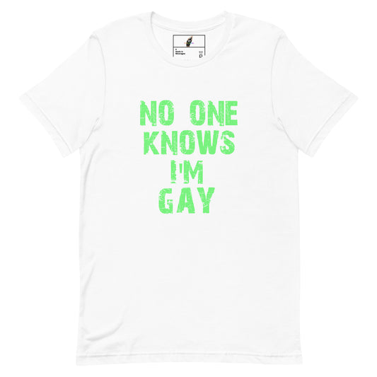 A white short-sleeve crewneck t-shirt with the phrase 'NO ONE KNOWS I'M GAY' printed in a distressed neon green font on the front.