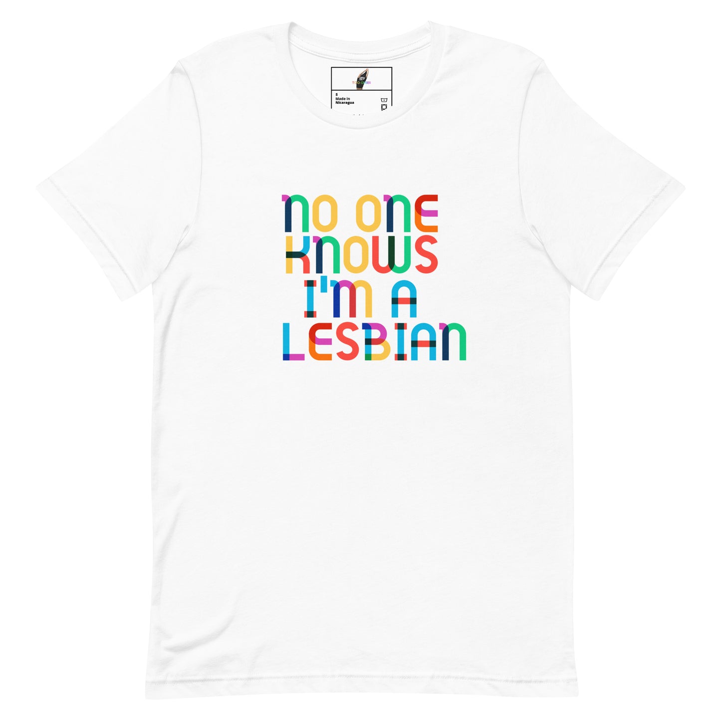 A white short-sleeve crewneck t-shirt featuring the text 'no one KNOWS I'm A LESBIAN' printed on the chest in a vibrant rainbow-colored block font. The shirt is displayed flat against a clean white background, with a small brand label visible inside the collar.