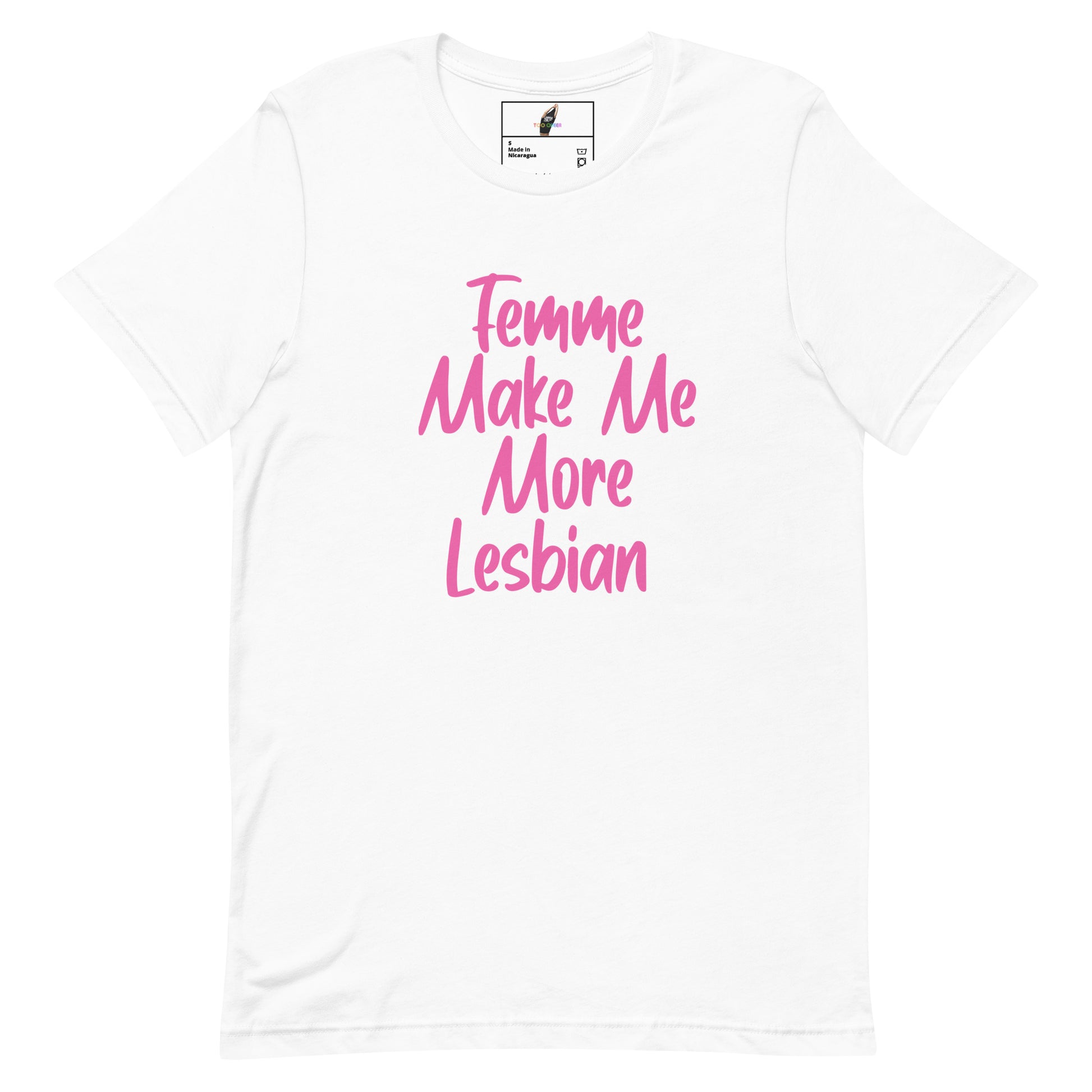 A white short-sleeve crewneck t-shirt featuring the phrase 'Femme Make Me More Lesbian' printed in pink script across the chest, displayed on a clean white background.