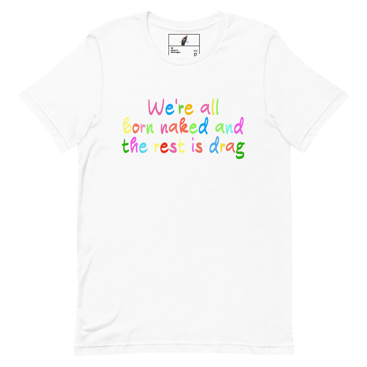 A white short-sleeve crewneck t-shirt featuring the phrase 'We're all born naked and the rest is drag' printed across the chest in a playful rainbow-colored font.