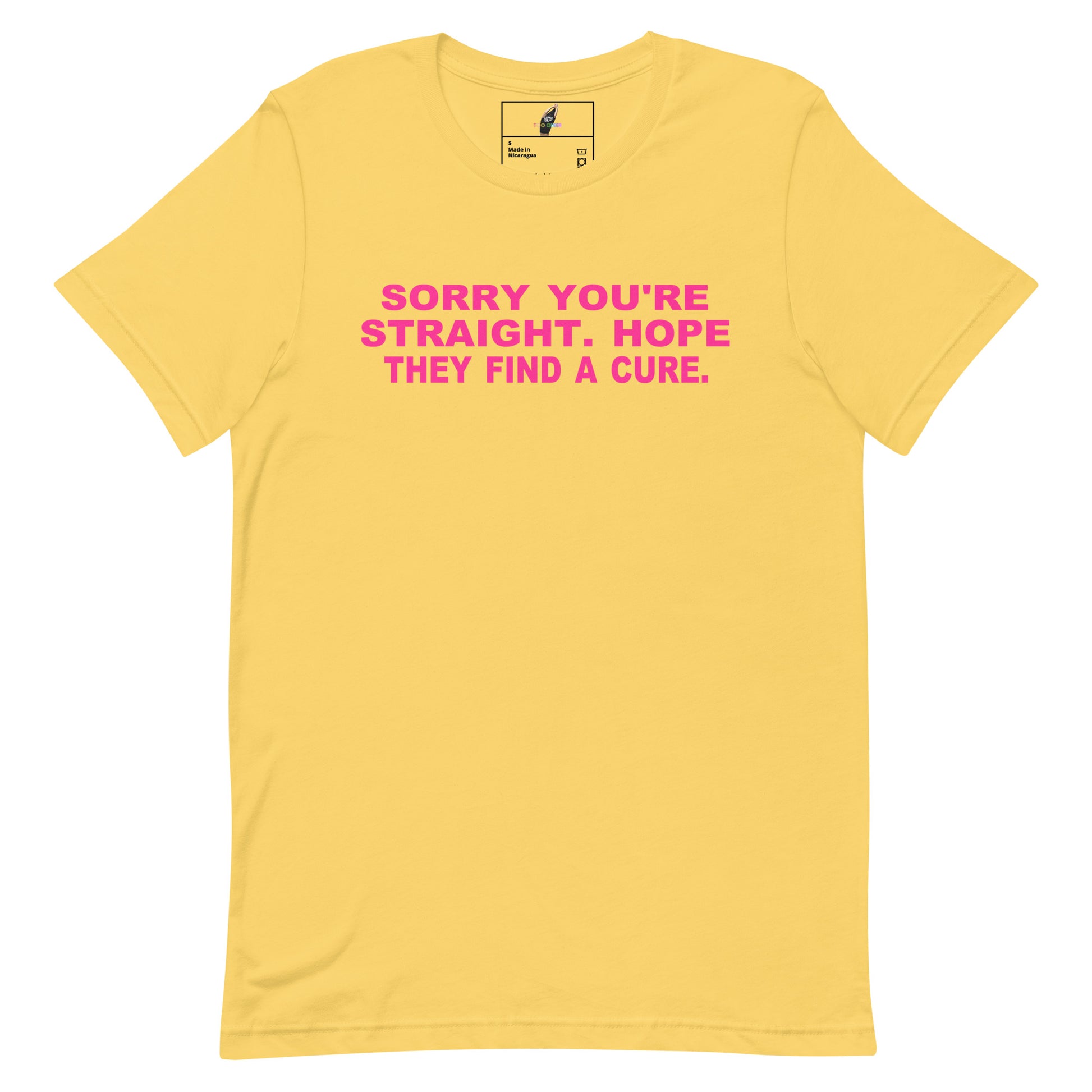 A yellow short-sleeve crewneck t-shirt with the text 'SORRY YOU'RE STRAIGHT, HOPE THEY FIND A CURE.' printed in pink across the chest, displayed on a clean white background.