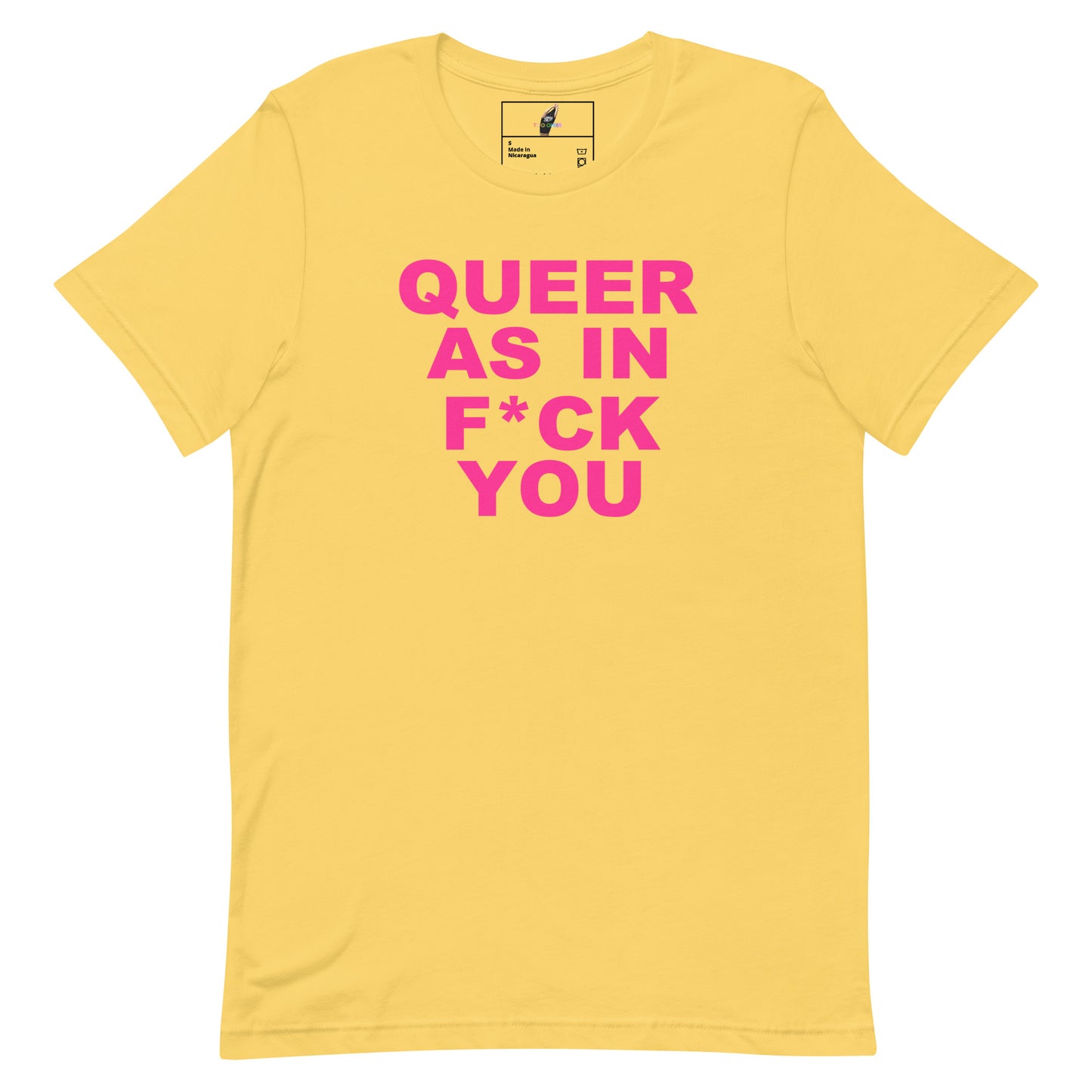 A yellow short-sleeve crewneck t-shirt with bold pink text on the front reading 'QUEER AS IN F*CK YOU'. The shirt is displayed flat against a solid white background, with a small brand label visible inside the collar.