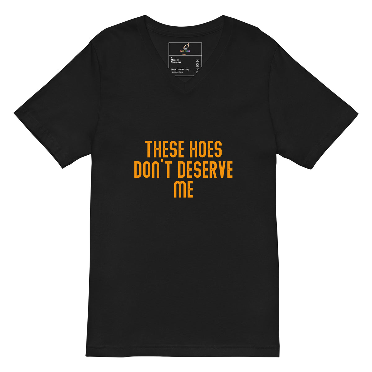 A black short-sleeve V-neck t-shirt with the text 'THESE HOES DON'T DESERVE ME' printed in orange across the chest, displayed on a solid white background.