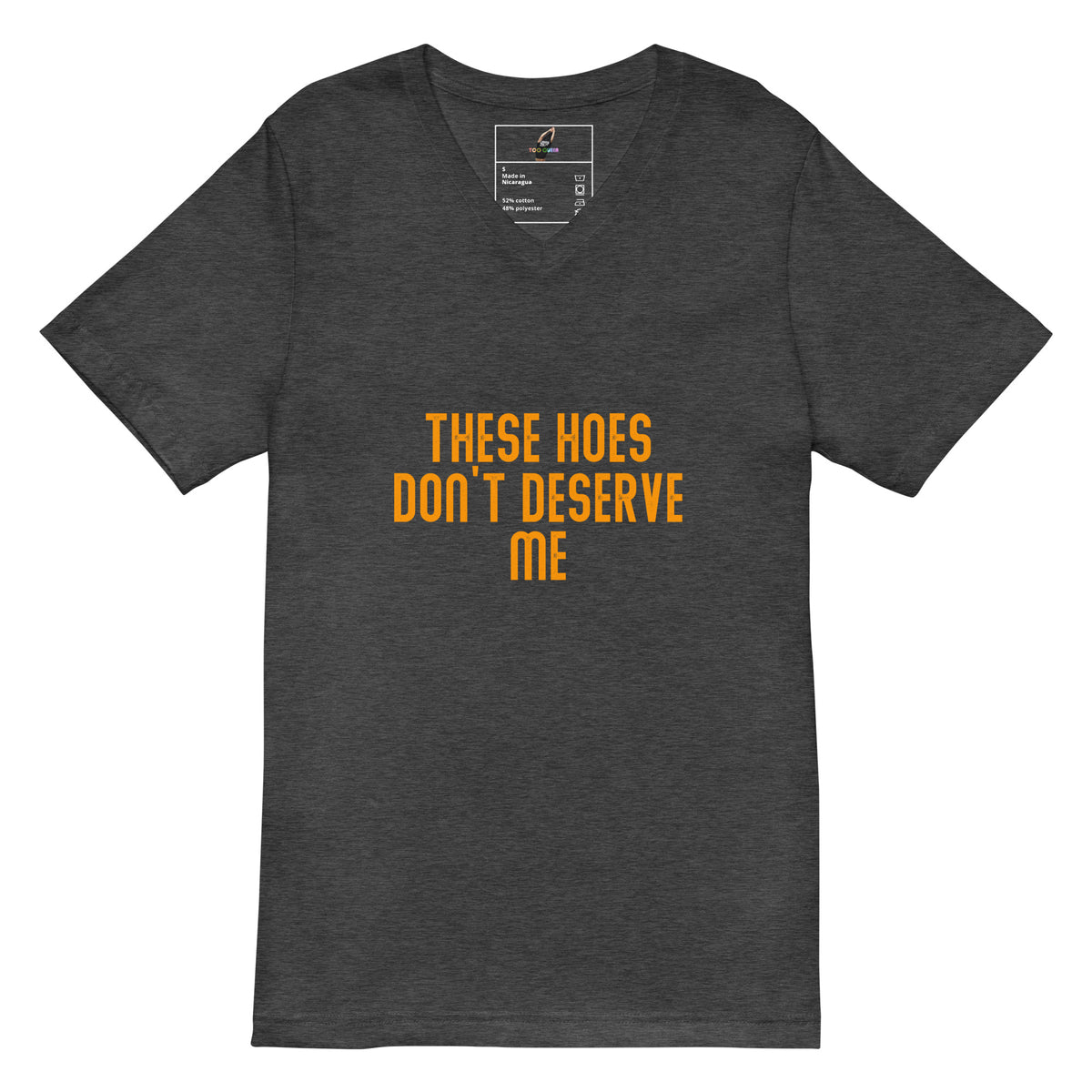 A dark heather gray v-neck t-shirt with the text 'THESE HOES DON'T DESERVE ME' printed in orange across the chest, displayed on a solid white background.