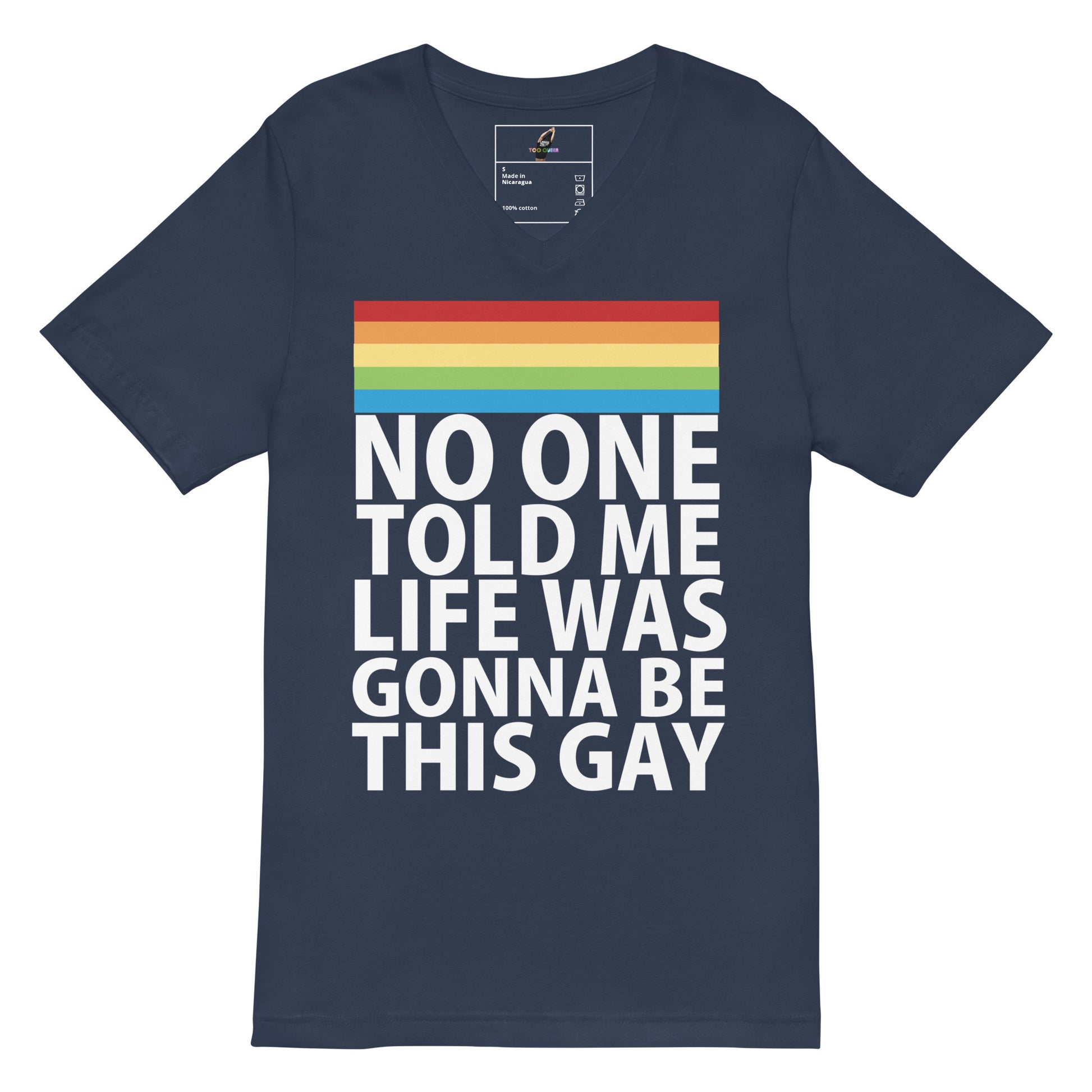 A navy blue V-neck t-shirt with a rainbow stripe graphic and the text 'NO ONE TOLD ME LIFE WAS GONNA BE THIS GAY' printed in white on the front, shown against a plain white background.