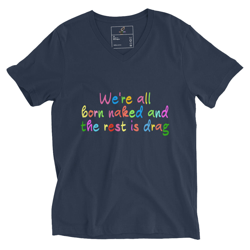 A navy blue women's V-neck t-shirt featuring the text 'We're all born naked and the rest is drag' printed in a vibrant, multicolored rainbow font across the chest.