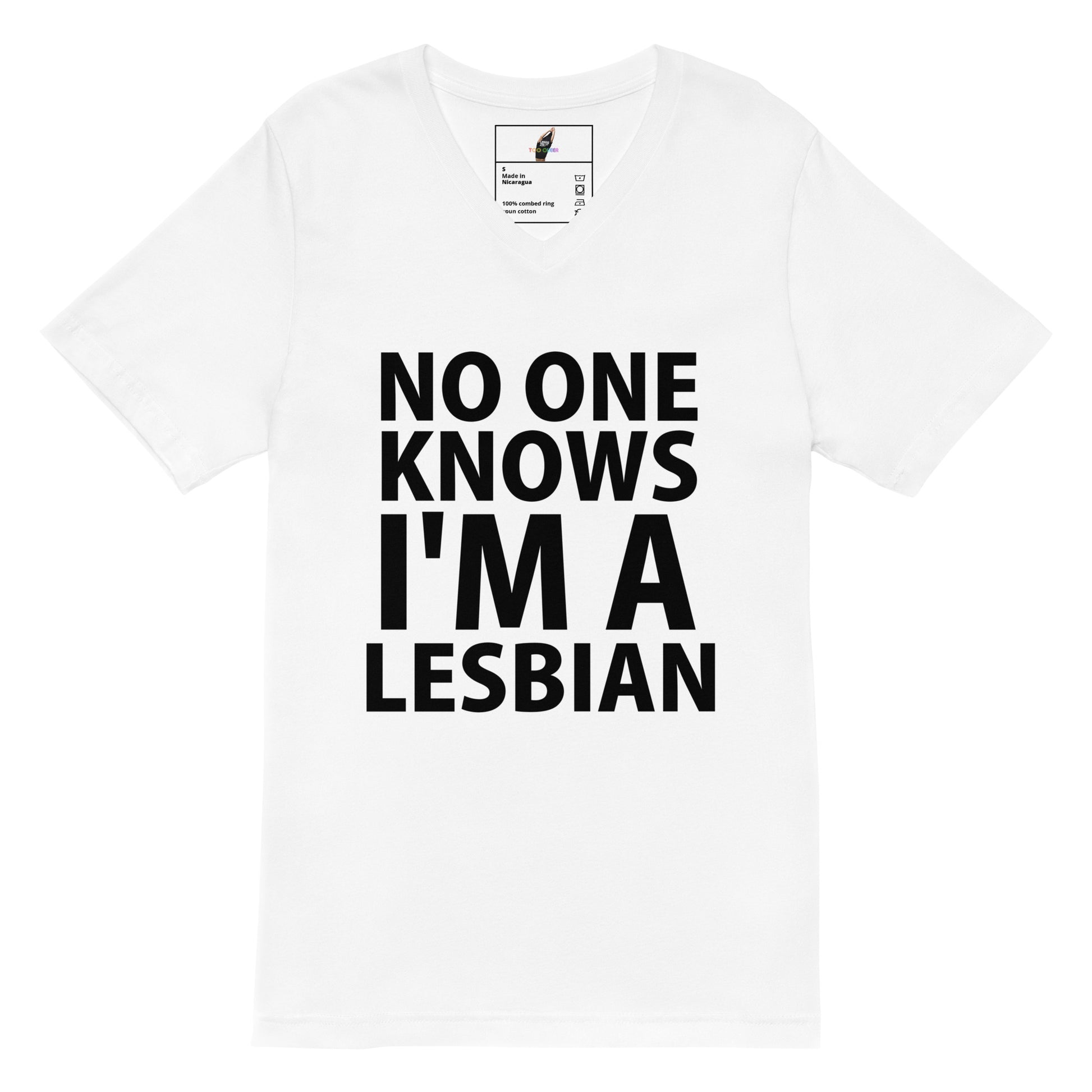 A white short-sleeve crewneck t-shirt with bold black text on the front reading 'NO ONE KNOWS I'M A LESBIAN'. The inner neck label shows the brand 'The Happy Apparel Co.